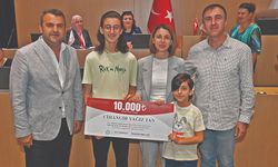Türkiye birincisi Tan’a ödül